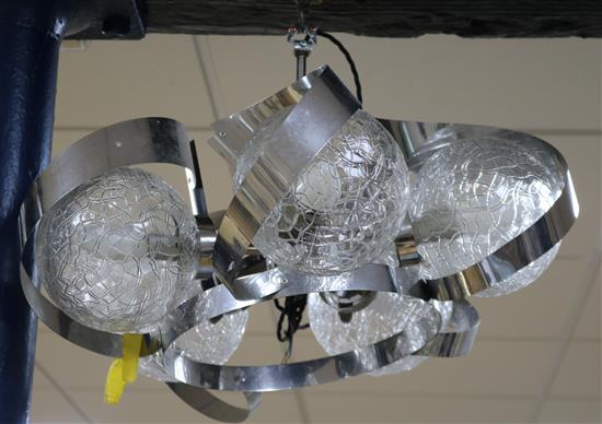 A chrome and glass five branch chandelier